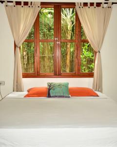 Un pat sau paturi într-o cameră la Casa Silvestre