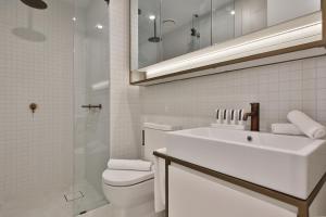 Koupelna v ubytování Domi Serviced Apartments