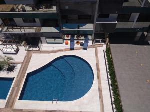 Pemandangan kolam renang di Apartamento de alto padrão no Spazio di Palmas atau berdekatan