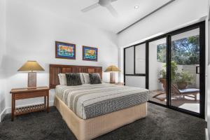 Voodi või voodid majutusasutuse Mirra Chana Beachfront Apartments Mooloolaba toas +37 fotot