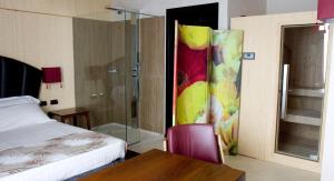 A bed or beds in a room at HM MotelHotel