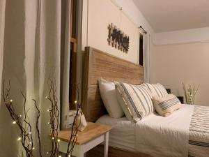 Voodi või voodid majutusasutuse Riverpath Inn toas