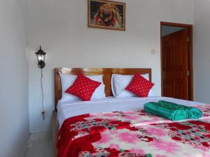Ένα ή περισσότερα κρεβάτια σε δωμάτιο στο Ming Homestay