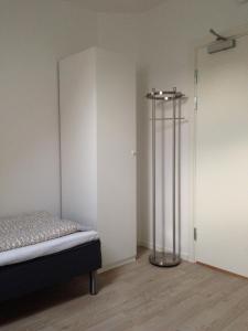Ліжко або ліжка в номері Pizza House Bed Simrishamn