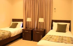 Voodi või voodid majutusasutuse BIG4 Stuart Range Outback Resort toas