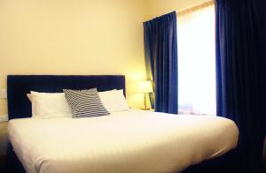 Voodi või voodid majutusasutuse BIG4 Stuart Range Outback Resort toas