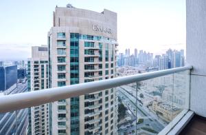 a view of a tall building in a city at Near Burj Khalifa, DownTown - Burj Al Nujoom in Dubai