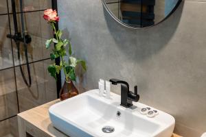 Kúpeľňa v ubytovaní P&O Serviced Apartments Group Komputerowa