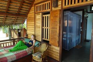 Posezení v ubytování Ganesh Garden Beach Cabanas