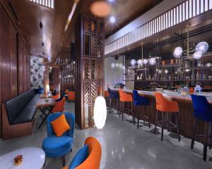 Zona d'estar a Quest Prime Cikarang by ASTON