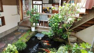 Taman di luar Walking Pilgrimage Hotel Tokiwa Ryokan