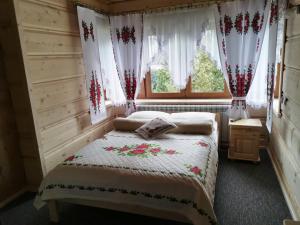 Posteľ alebo postele v izbe v ubytovaní Pokoje gościnne Pod Limbami