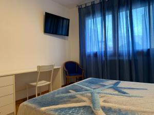 Postel nebo postele na pokoji v ubytování Residence Speranza