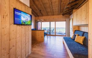 Televízia a/alebo spoločenská miestnosť v ubytovaní Panorama Hotel Guggenbichl - inkl Sommerkarte, einmaliger Eintritt ins Tauern Spa & bester Ausblick über Kaprun
