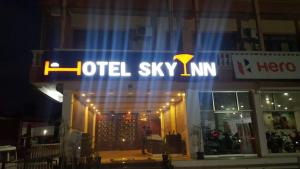 a hotel skymi sign on the front of a building at Hotel Sky Inn in Jaipur