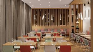 Um restaurante ou outro lugar para comer em Holiday Inn Frankfurt - Alte Oper by IHG