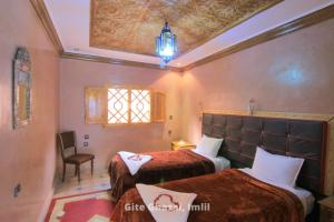 Uma cama ou camas num quarto em Chez Ghazal Imlil