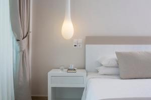 Voodi või voodid majutusasutuse Kassandra Bay Resort, Suites & Spa toas