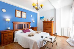 Posteľ alebo postele v izbe v ubytovaní Villa Golf Sanlucar