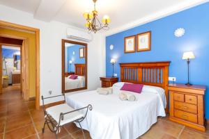 Posteľ alebo postele v izbe v ubytovaní Villa Golf Sanlucar