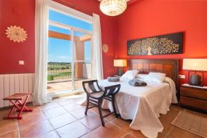 Posteľ alebo postele v izbe v ubytovaní Villa Golf Sanlucar