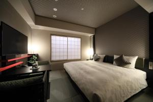 Postelja oz. postelje v sobi nastanitve Hotel Resol Trinity Kyoto