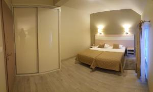 Posteľ alebo postele v izbe v ubytovaní Atrakcyjny Apartament Czarna Góra