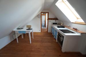 Kuchyň nebo kuchyňský kout v ubytování Apartmán Malšín 2
