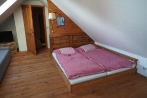 Postel nebo postele na pokoji v ubytování Apartmán Malšín 2