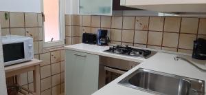 Kuchyň nebo kuchyňský kout v ubytování Appartamenti Clara