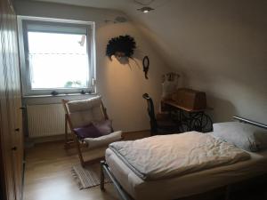 Giường trong phòng chung tại Ferienwohnung Münch