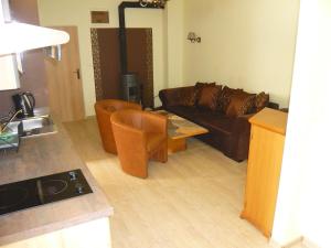 Kuchyň nebo kuchyňský kout v ubytování Apartmány Liška