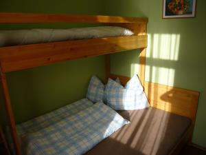 Postel nebo postele na pokoji v ubytování Apartmány Liška