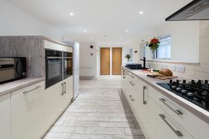 Køkken eller tekøkken på Oasis Apartment