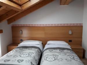 Postel nebo postele na pokoji v ubytování Hotel Panorama