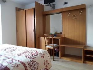 Postel nebo postele na pokoji v ubytování Hotel Panorama