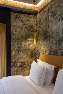 Postel nebo postele na pokoji v ubytování Apartments Pateo - Lisbon Lounge Suites