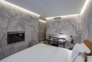 Postel nebo postele na pokoji v ubytování Apartments Pateo - Lisbon Lounge Suites