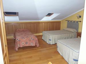 Cama o camas de una habitación en Hostal-Restaurante San Antolín