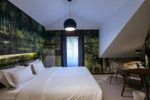 Postel nebo postele na pokoji v ubytování Apartments Pateo - Lisbon Lounge Suites