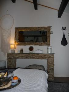 מיטה או מיטות בחדר ב-La Singlantane