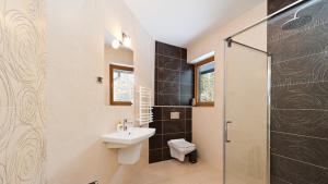 Kúpeľňa v ubytovaní Apartamenty Sun & Snow Kościelisko Czajki