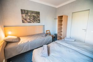 Postel nebo postele na pokoji v ubytování Hostel Sili