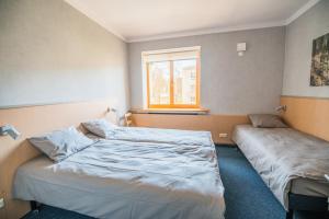 Postel nebo postele na pokoji v ubytování Hostel Sili