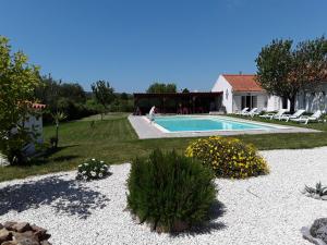 Piscina a Quinta Camargue o a prop