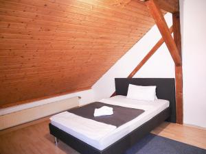 SUNNYHOME Monteurwohnungen und Apartments in Schwandorf tesisinde bir odada yatak veya yataklar