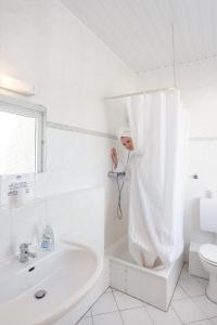 Ein Badezimmer in der Unterkunft Boardinghouse Gladbeck