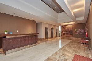 Lobby o reception area sa Departamentos Condominio Wyndham Nordelta - Desayuno y Spa Opcional !
