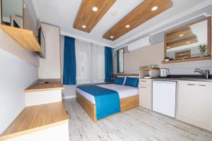 A kitchen or kitchenette at Marina Hotel Bodrum