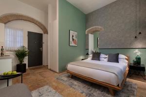 Voodi või voodid majutusasutuse Villa Albi - Machne Yehuda Hotel toas